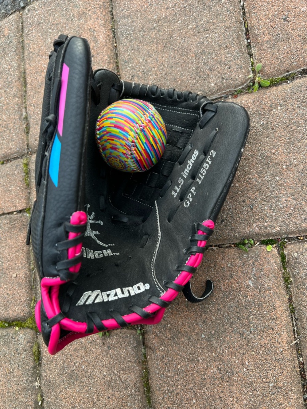 Mizuno LEFTY Black Baseball Glove with Pink Trim and Colorful Practice Ball